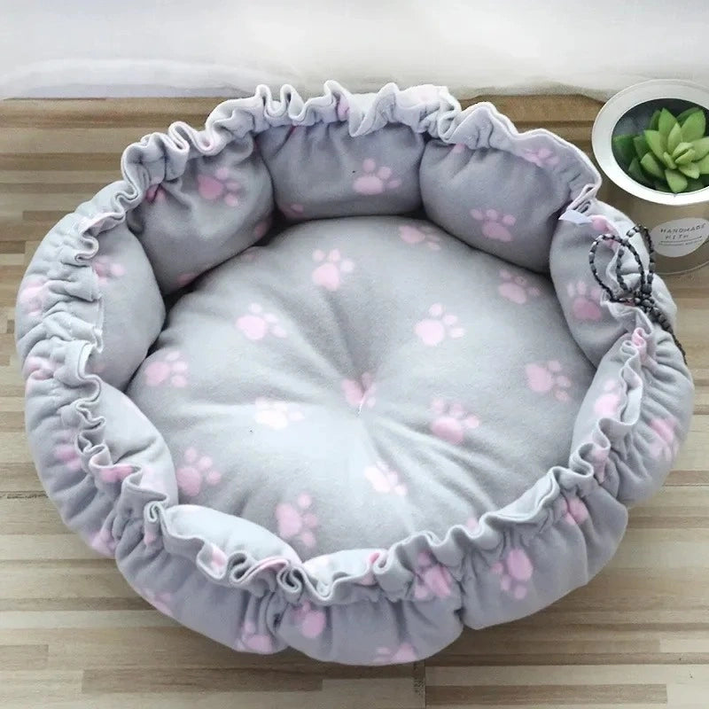 coussin pour chat avec motif empreinte rose de chat
