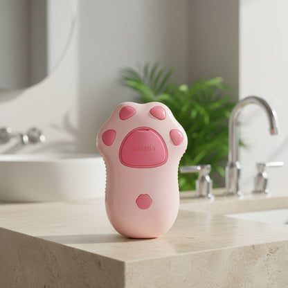 Brosse vapeur pour chat rose dans une salle de bain