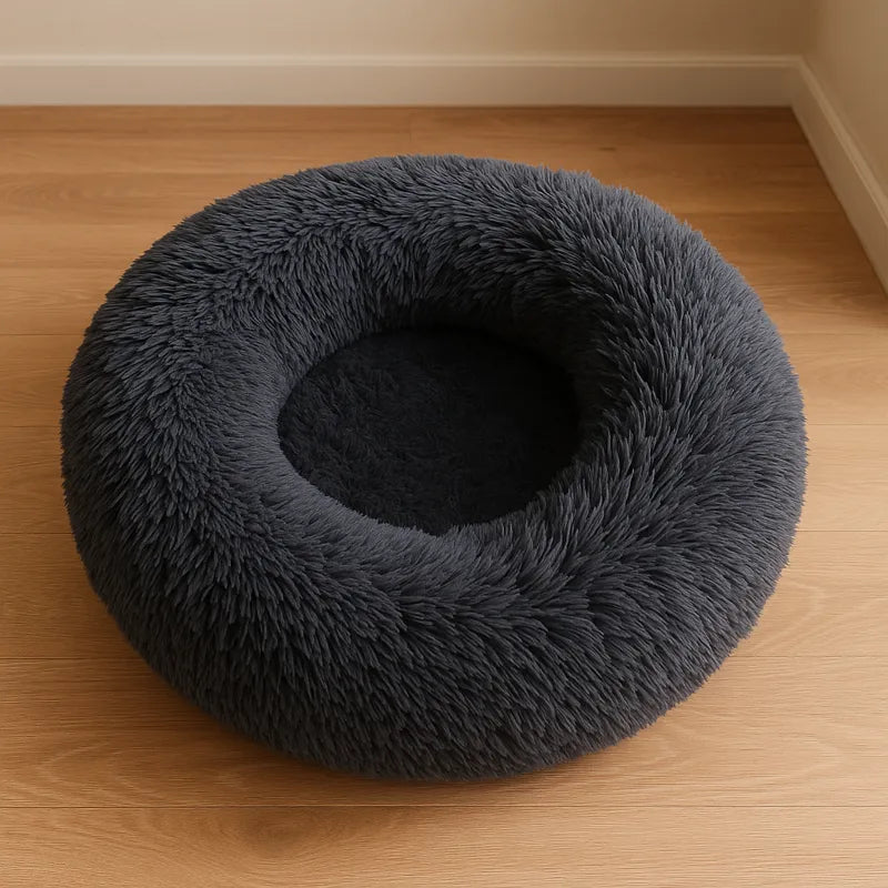 Coussin pour chat noir en forme de rond et douillet