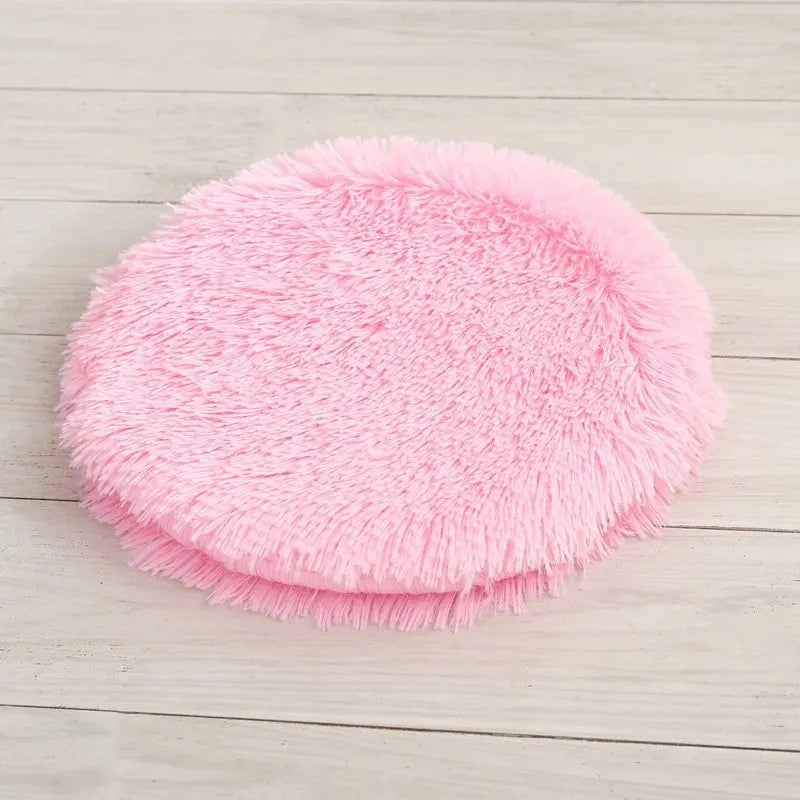 Coussin pour chat rose moelleux rond confort repos douillet