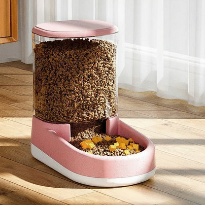 distributeur croquettes chat automatique de couleur rose
