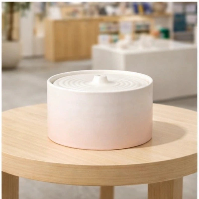 Fontaine à eau pour chat en céramique blanche avec dégradé rose pâle