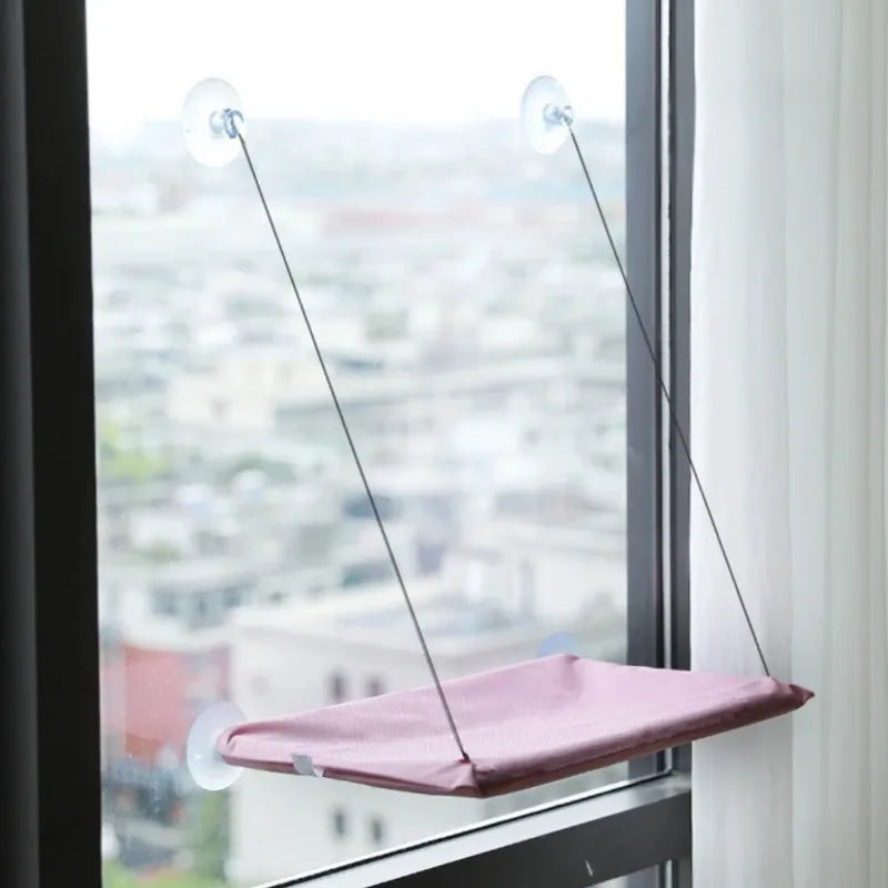 hamac chat rose fixé à la fenêtre solide