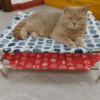 hamac chat rouge et blanc avec chat roux allongé