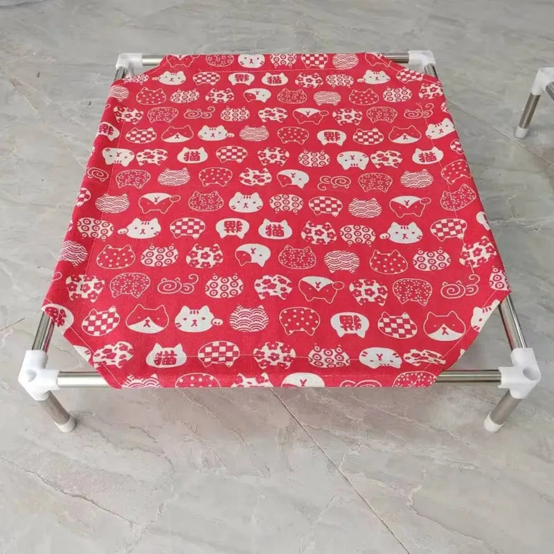 hamac chat rouge avec motif tête de chat blanc