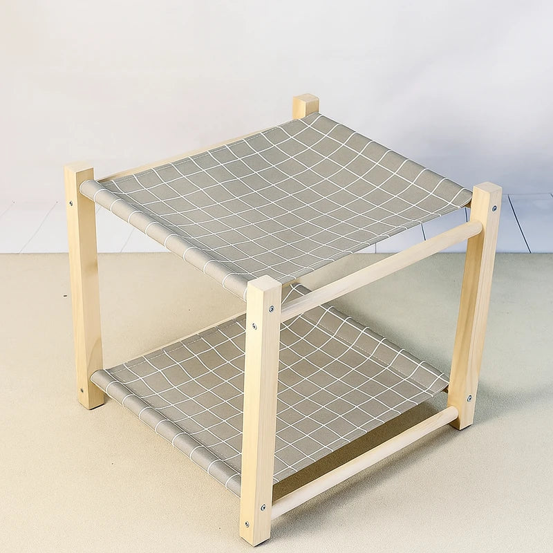 hamac pour chat gris avec des lignes blanches structure solide