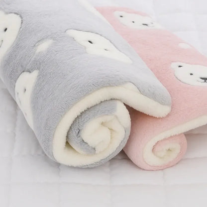 Lit pour chat gris et rose avec motifs ours blancs