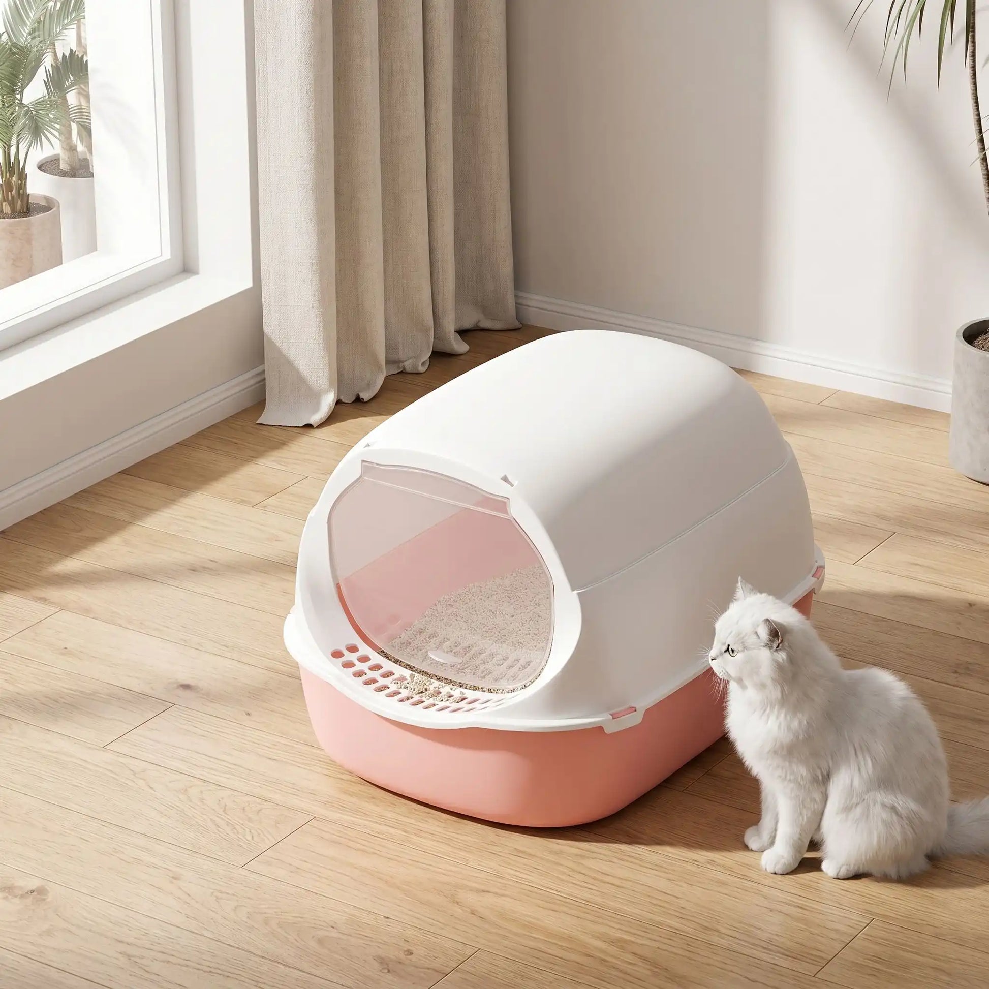 litiere fermée pour chat rose avec chat blanc assis