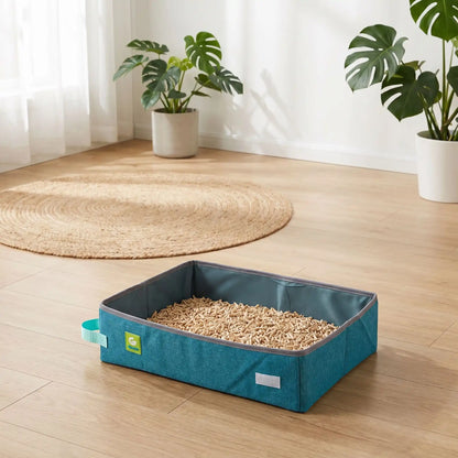litière de voyage pour chat bleu sur sol
